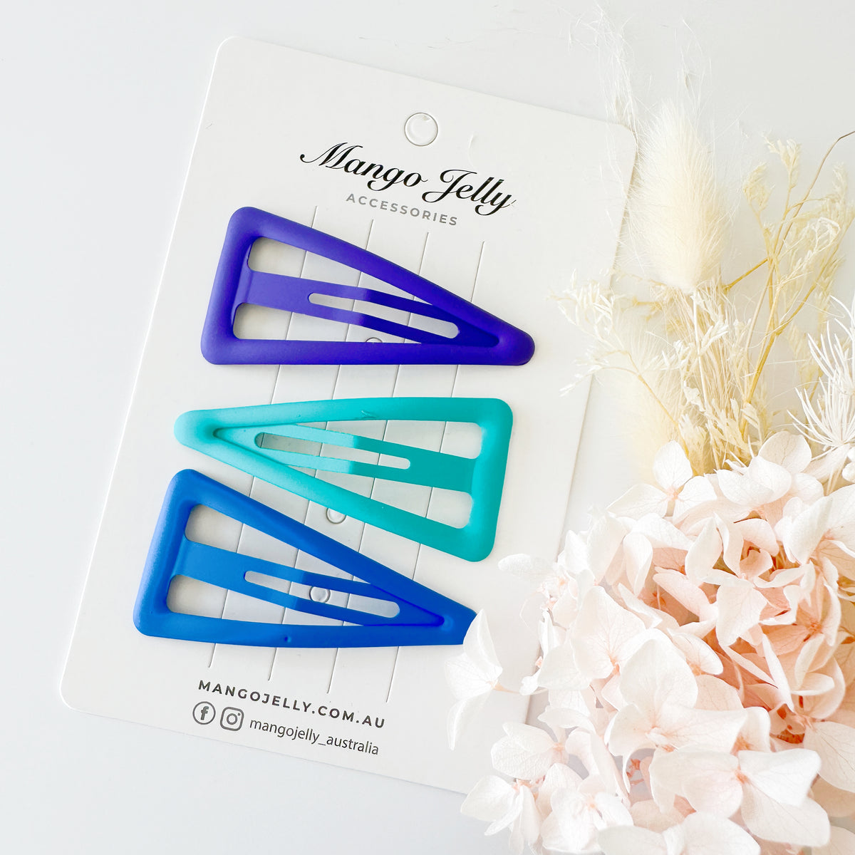 Large pastel coated triangle snaps - Blue