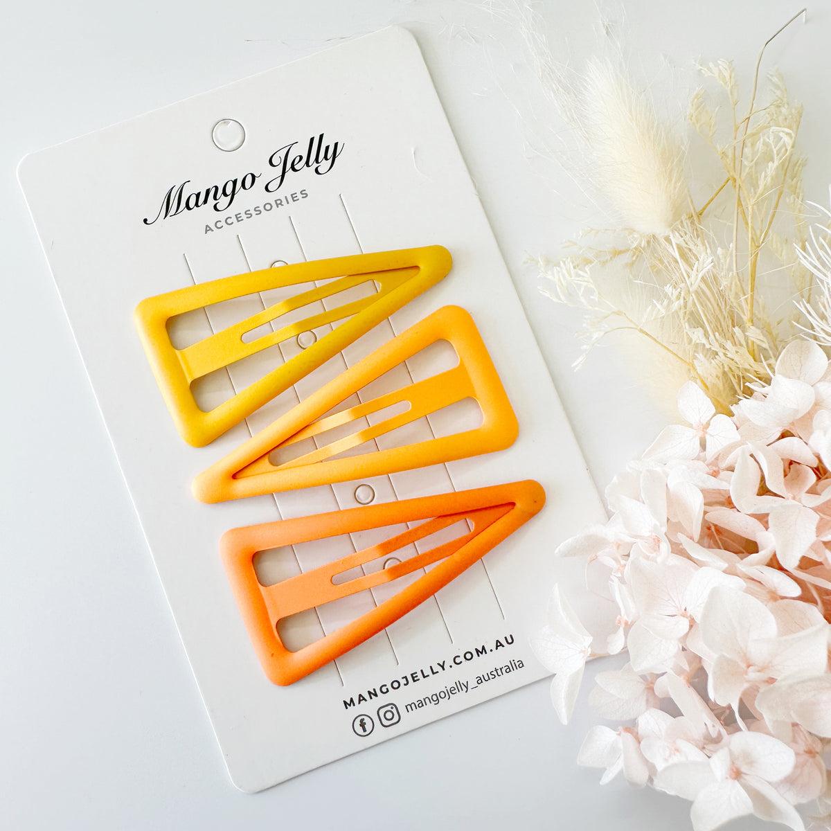 Large pastel coated triangle snaps - Citrus